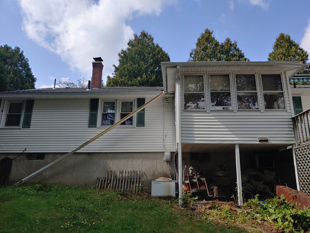 5 Capt Peter Simpson Road Millbury, MA 01527 - Photo 35 of 35 a view of a house with pool and chairs