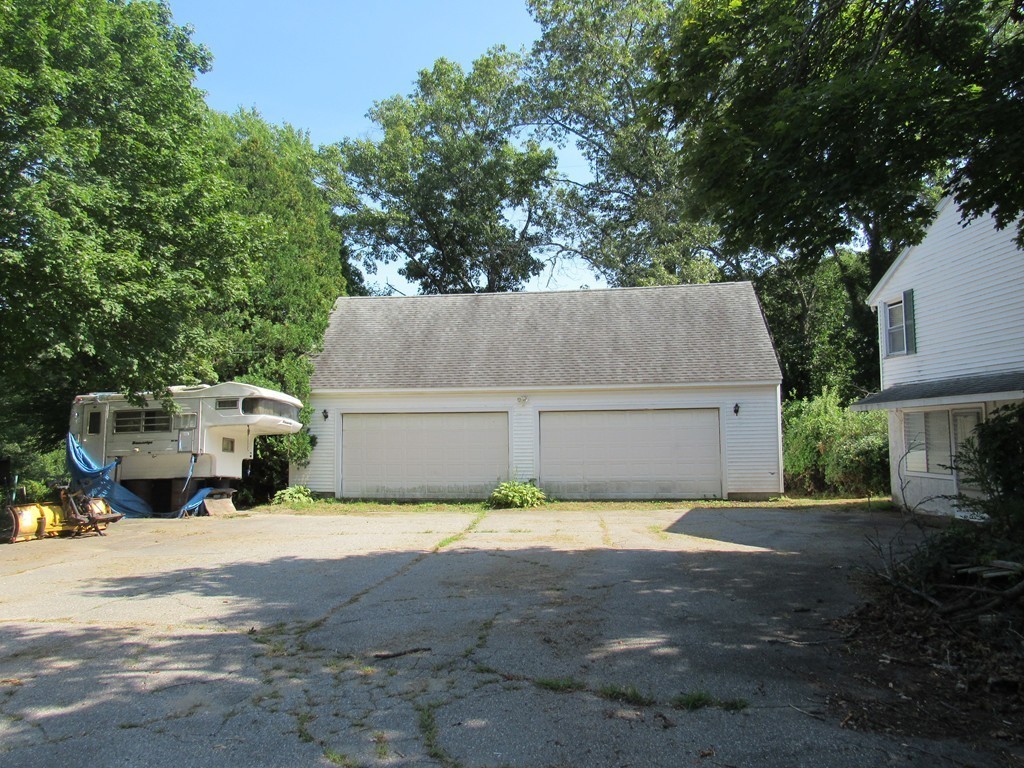5 Capt Peter Simpson Road Millbury, MA 01527 - Photo 5 of 35 a view of a house with pool and a fire pit