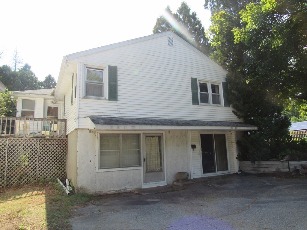 5 Capt Peter Simpson Road Millbury, MA 01527 - Photo 7 of 35 a front view of a house with a garage