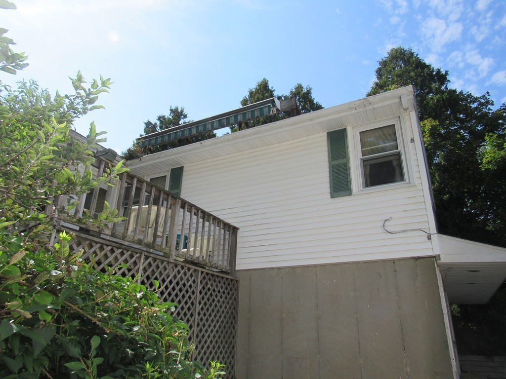 5 Capt Peter Simpson Road Millbury, MA 01527 - Photo 8 of 35 a view of a house with a small yard