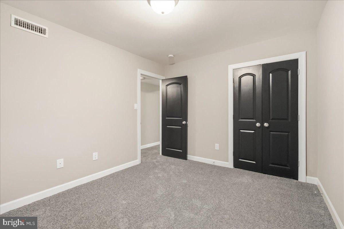 10860-10864 Bucknell Drive, Unit 301 Silver Spring, MD 20902 - Photo 13 of 24 a view of an empty room