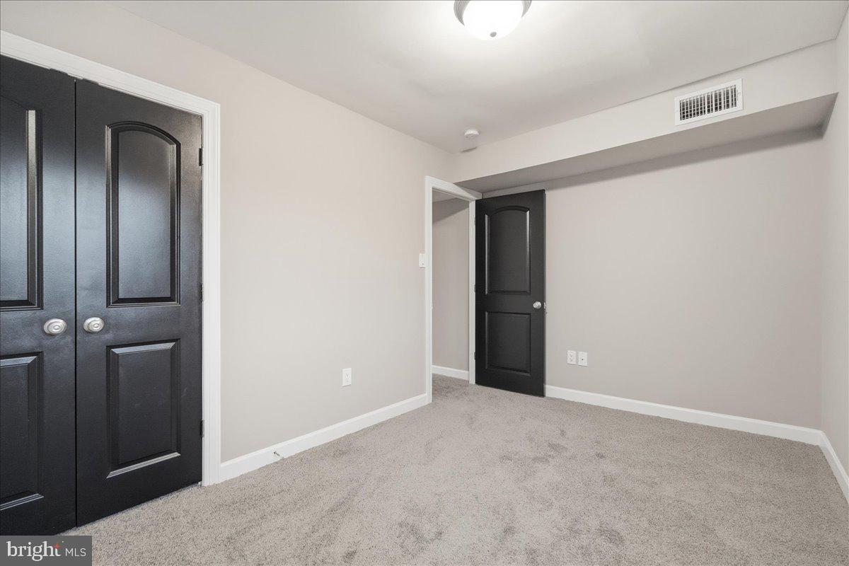 10860-10864 Bucknell Drive, Unit 301 Silver Spring, MD 20902 - Photo 15 of 24 a view of an empty room
