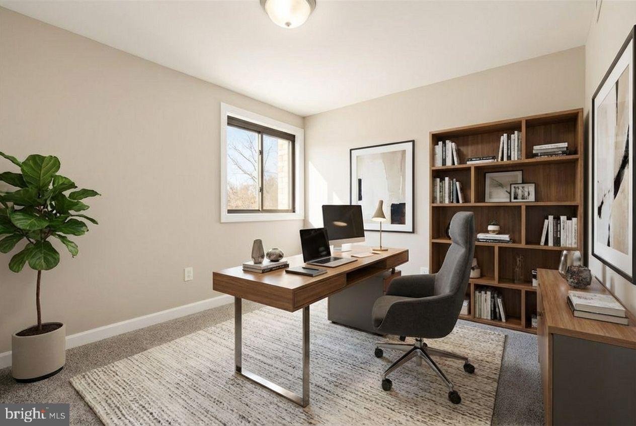 10860-10864 Bucknell Drive, Unit 301 Silver Spring, MD 20902 - Photo 5 of 24 a work room with furniture and a potted plant