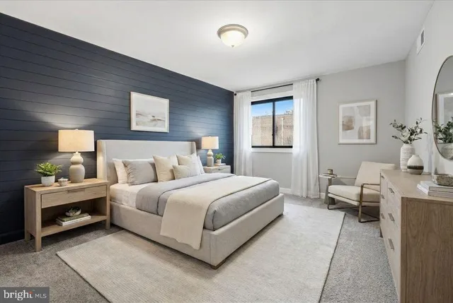 a view of empty room with a large window