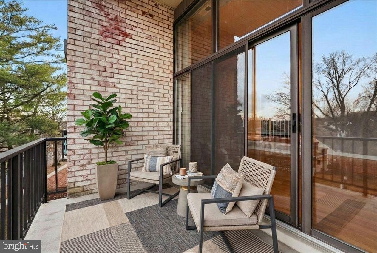 10860-10864 Bucknell Drive, Unit 301 Silver Spring, MD 20902 - Photo 8 of 24 a building outdoor space with patio furniture