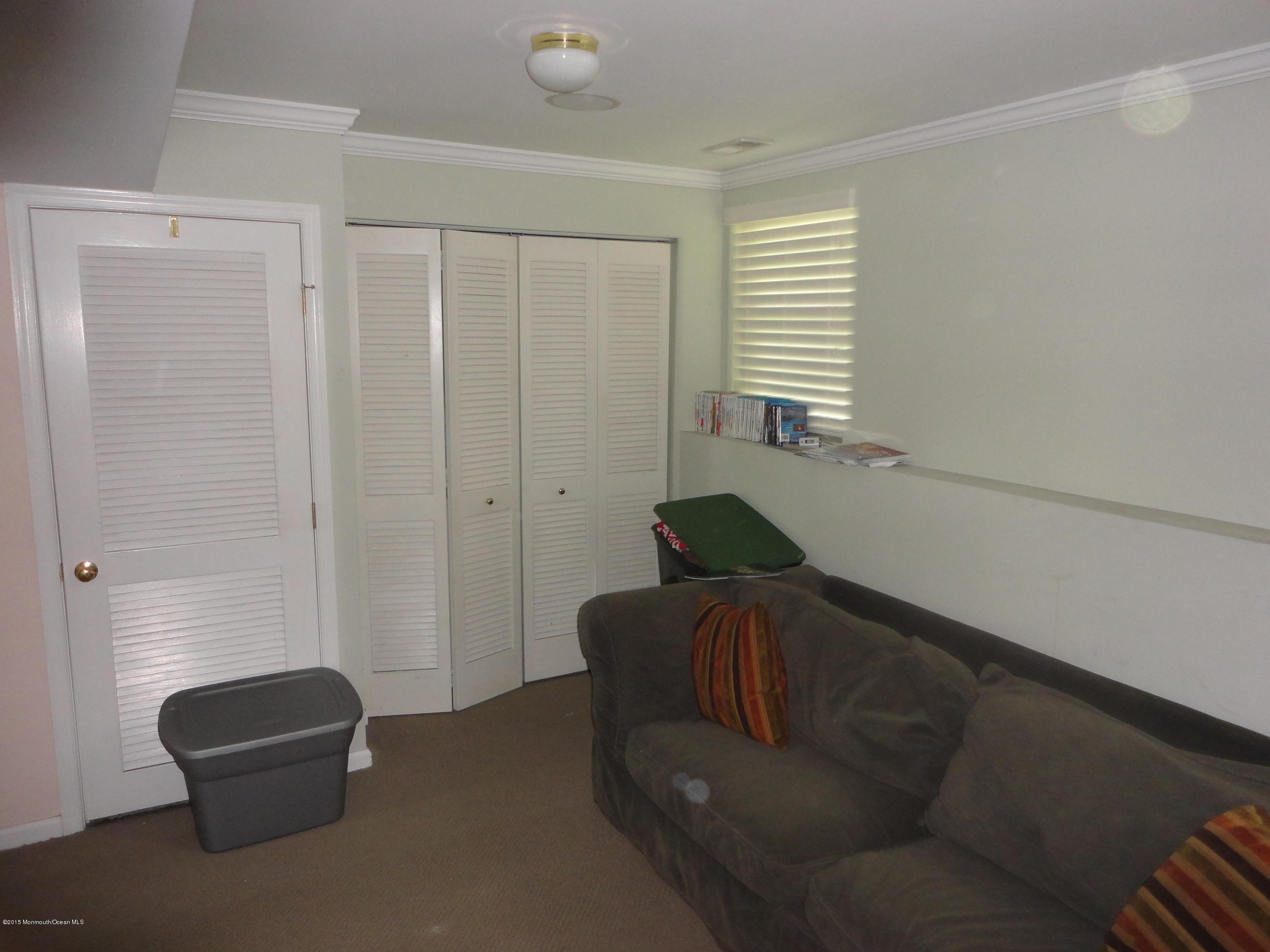 1 Saxton Road, Unit 64 Farmingdale, NJ 07727 - Photo 3 of 32 Family Room Ground Level