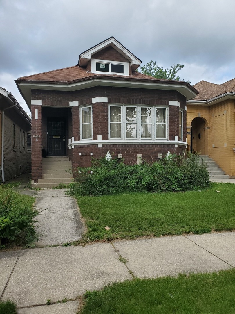 front view of house with a yard