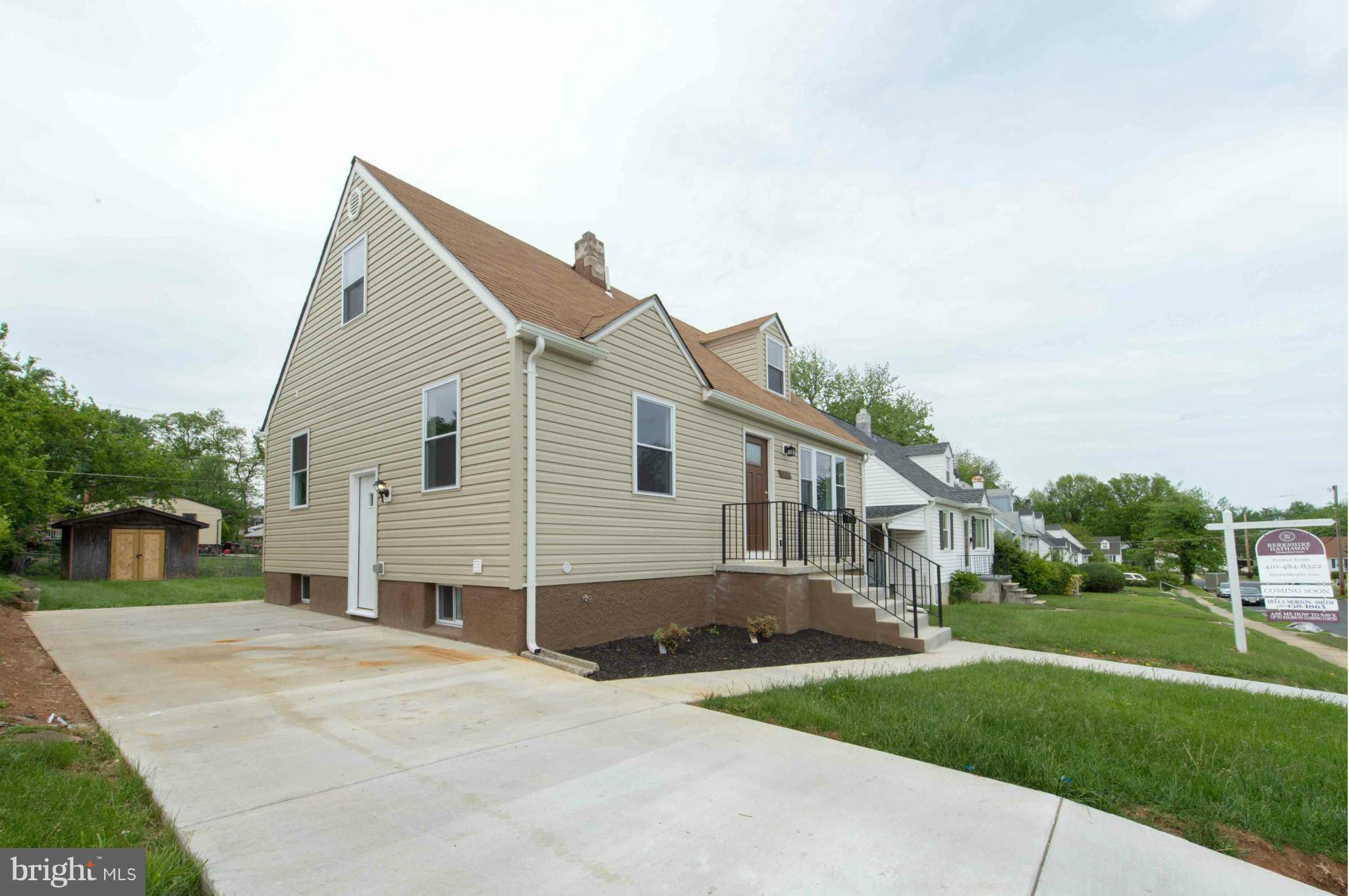 3822 Byfield Road Baltimore, MD 21207 - Photo 2 of 30 a view of a house with a yard