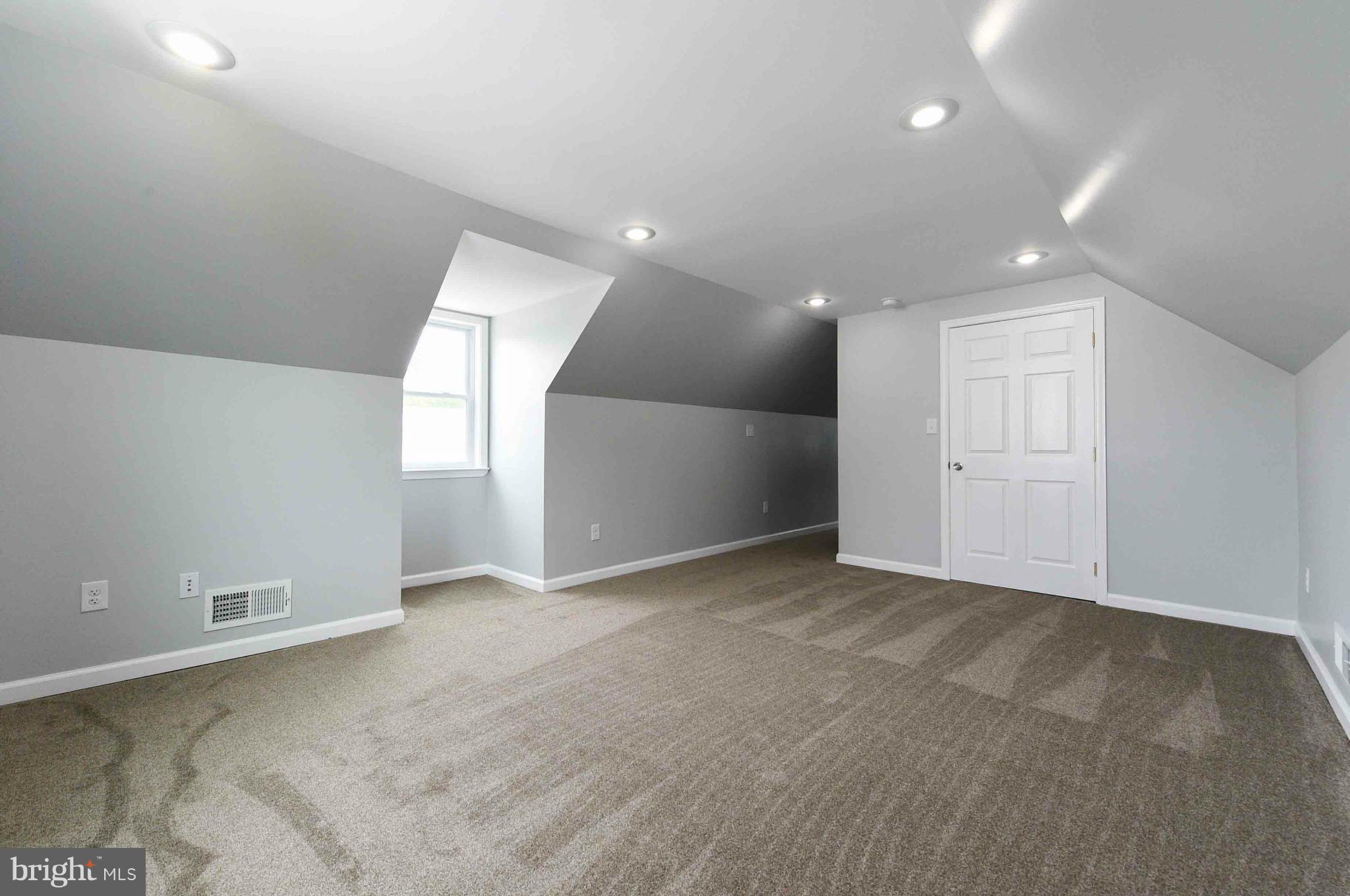 3822 Byfield Road Baltimore, MD 21207 - Photo 17 of 30 an empty room with windows
