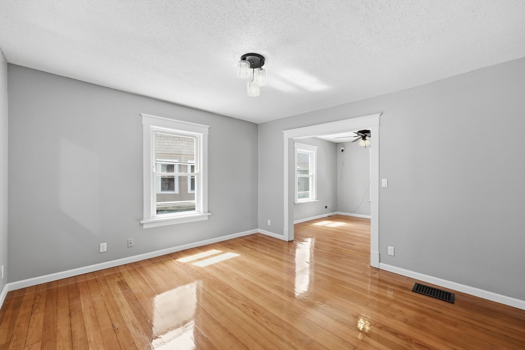 62 Kenyon Street Springfield, MA 01109 - Photo 5 of 26 a view of livingroom with hardwood floor