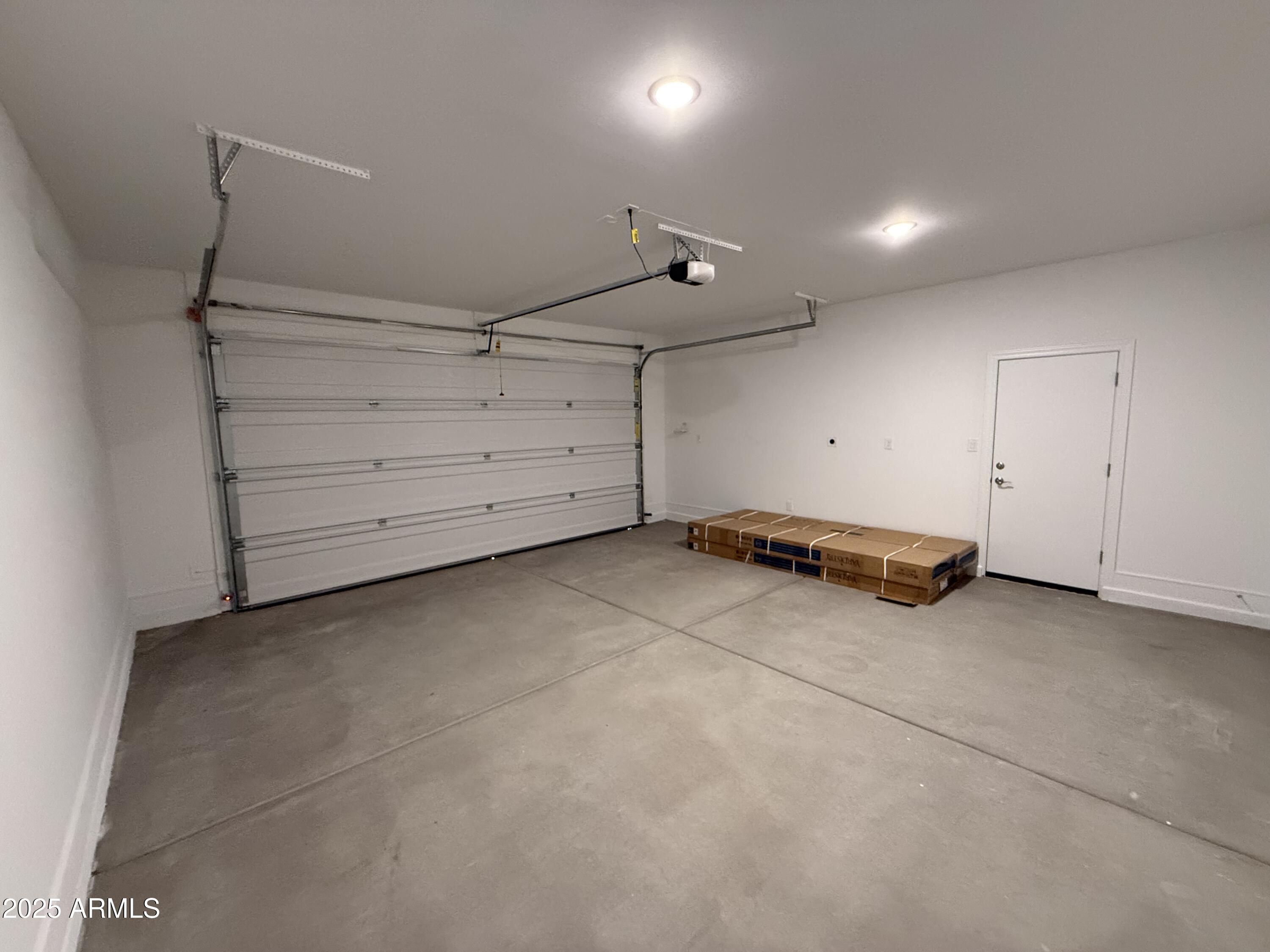 2390 West Los Arboles Place Chandler, AZ 85224 - Photo 13 of 41 a view of a garage room