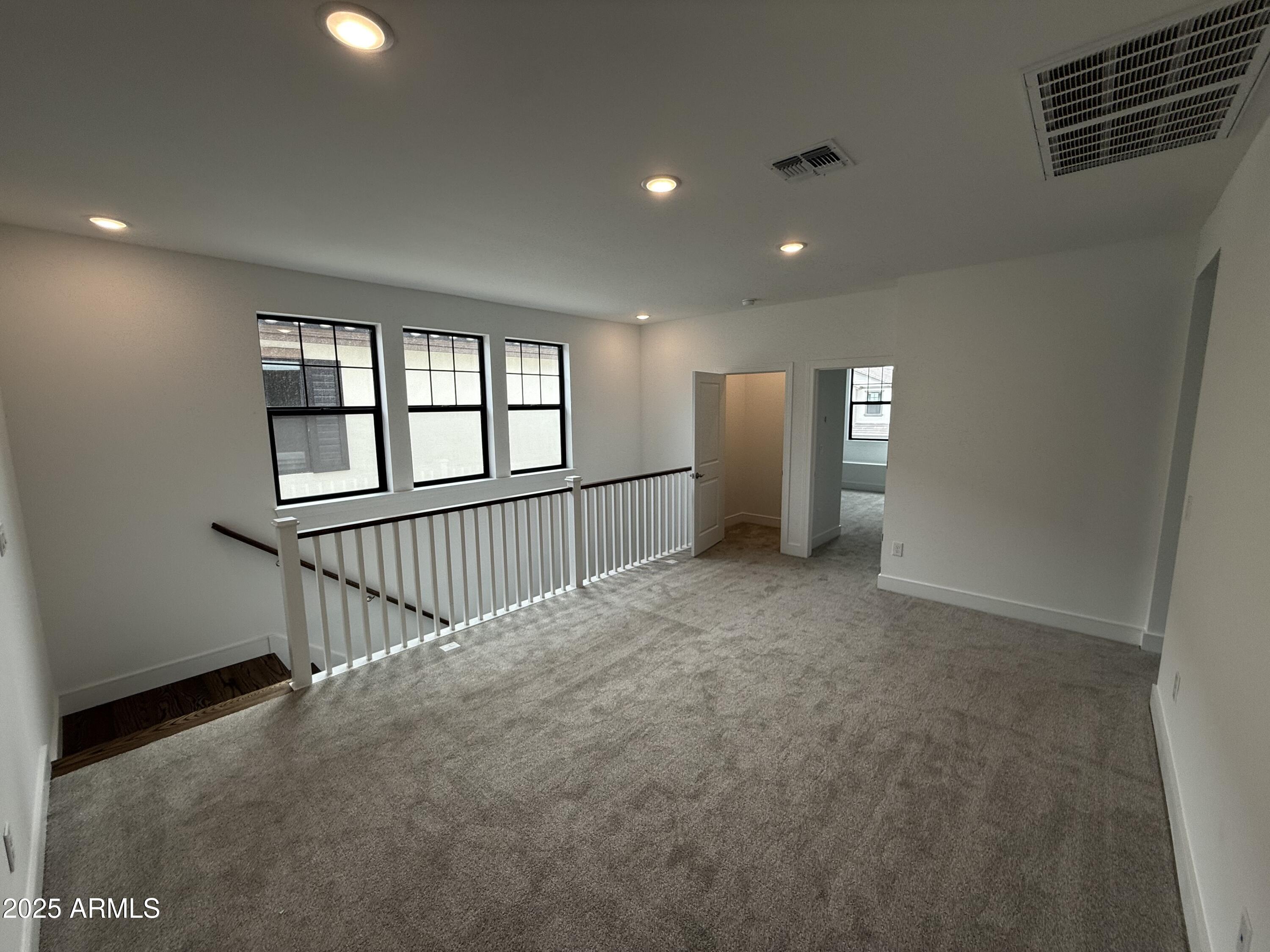 2390 West Los Arboles Place Chandler, AZ 85224 - Photo 18 of 41 a view of an empty room with a window