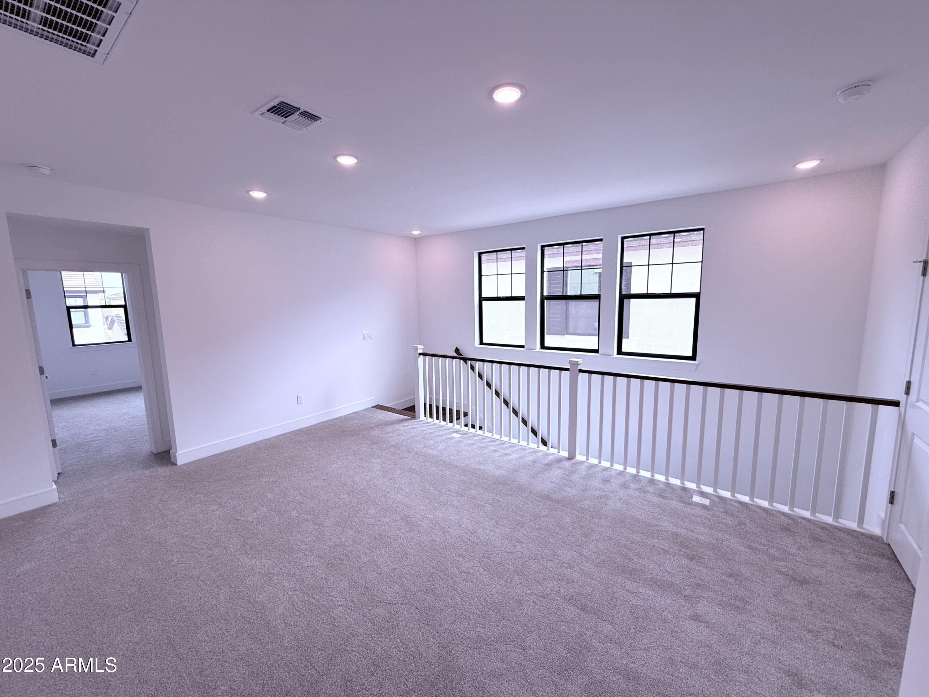 2390 West Los Arboles Place Chandler, AZ 85224 - Photo 19 of 41 a view of an empty room and window