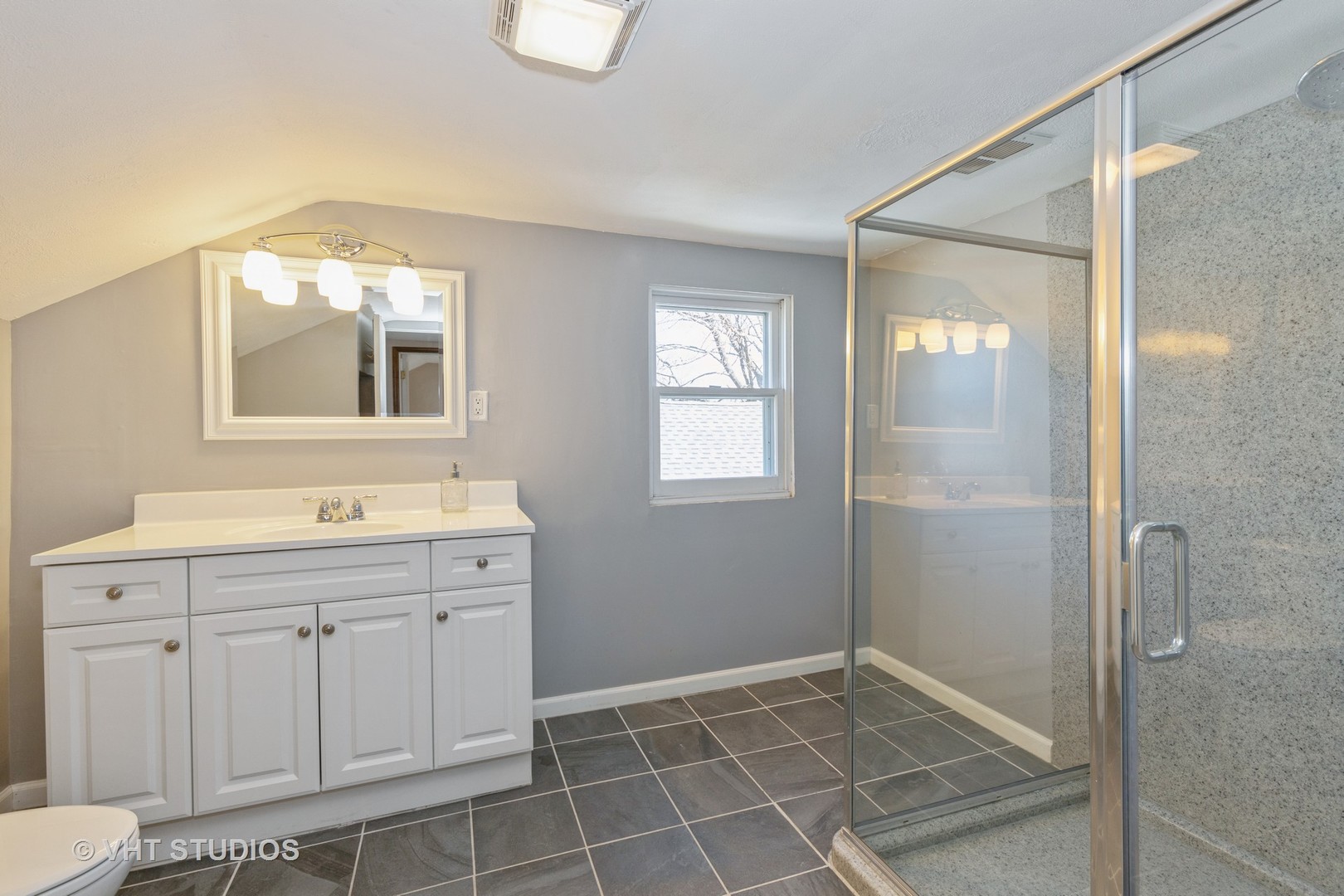 28 Lippincott Road Fox Lake, IL 60020 - Photo 14 of 18 a bathroom with a sink a toilet and shower