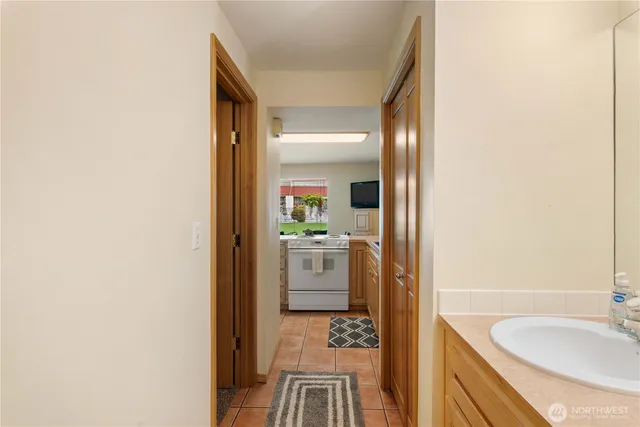 a en suite bathroom with a sink and a mirror