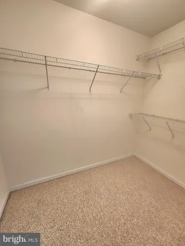 a bathroom with a sink double vanity granite tub and shower