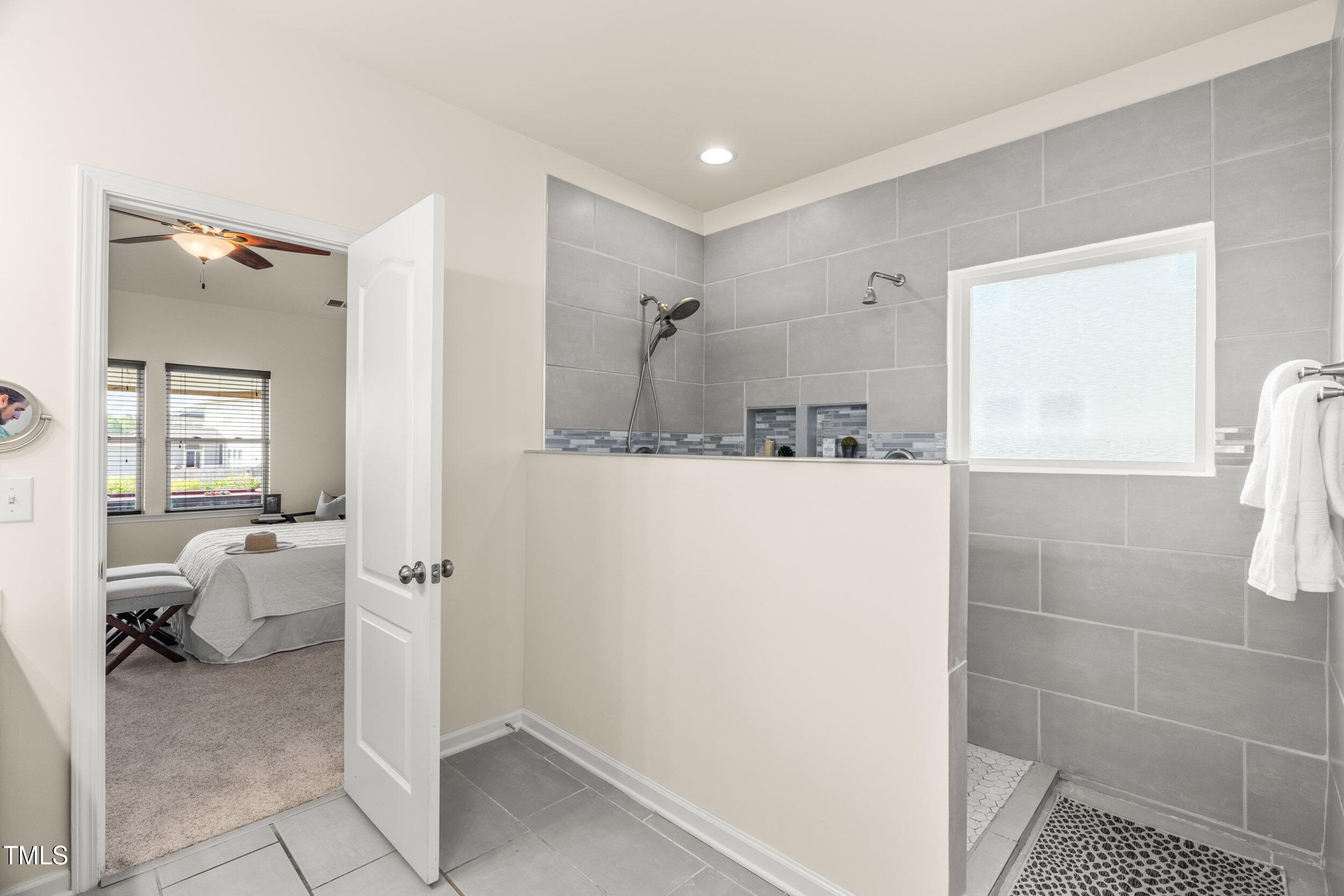 1304 Ivey Grove Court Fuquay-Varina, NC 27526 - Photo 23 of 44 a bathroom with a sink and a mirror