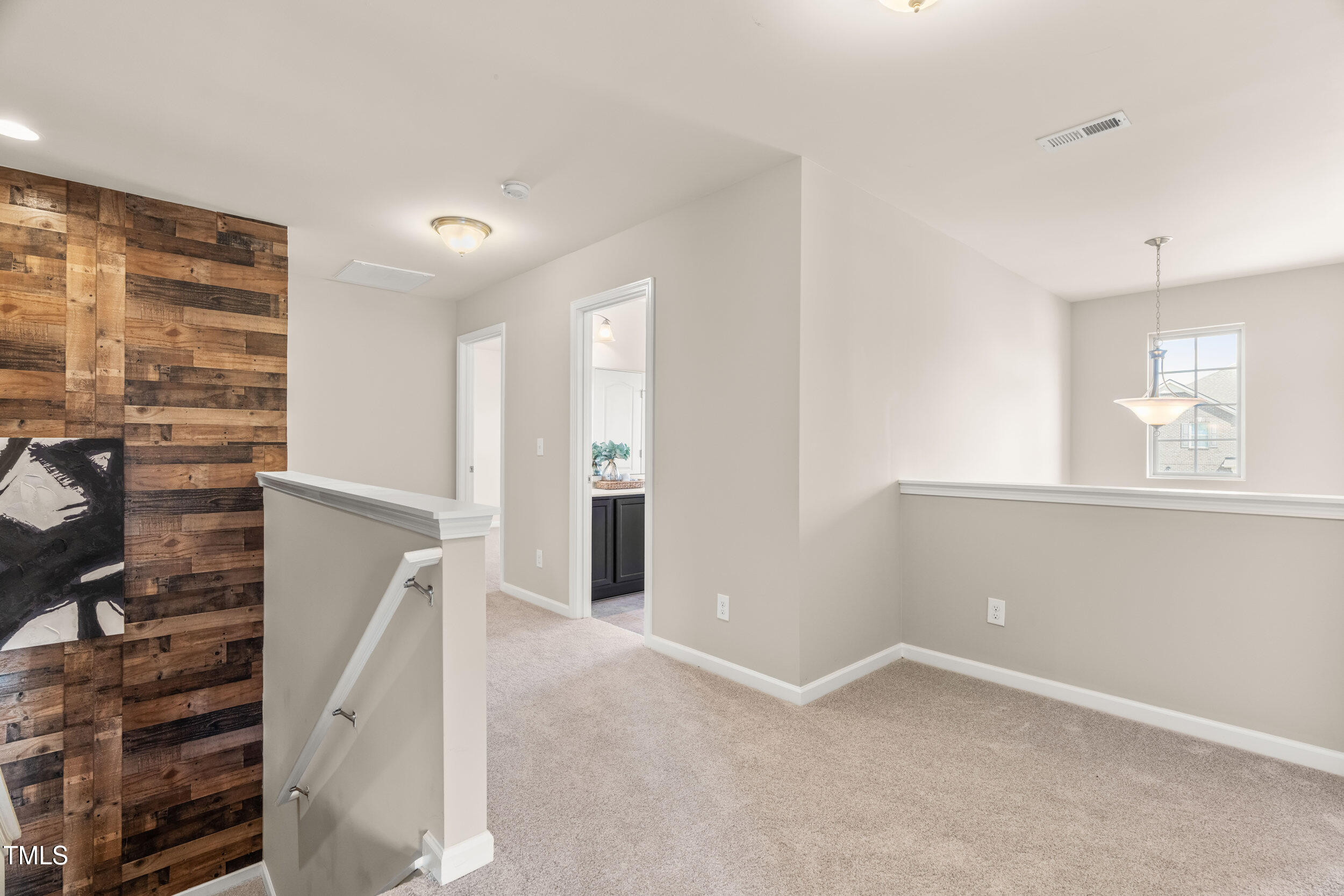 1304 Ivey Grove Court Fuquay-Varina, NC 27526 - Photo 24 of 44 a view of an empty room with a window