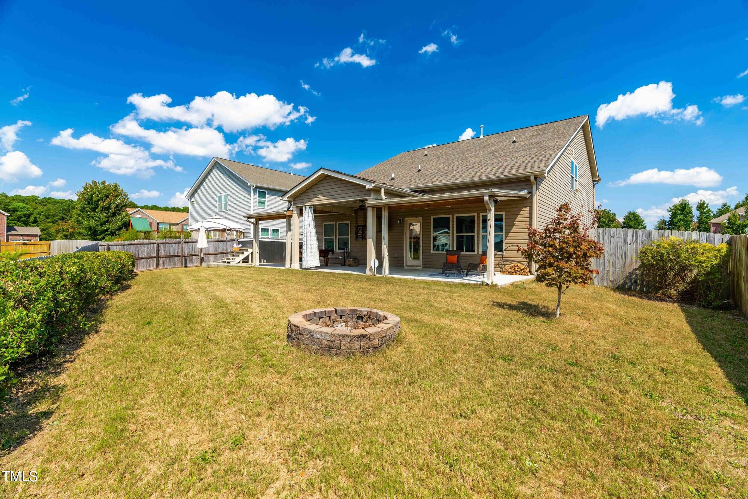 1304 Ivey Grove Court Fuquay-Varina, NC 27526 - Photo 37 of 44 a front view of a house with swimming pool