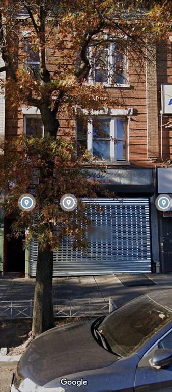 1470 Flatbush Avenue Brooklyn, NY 11210 - Photo 2 of 2 a view of a building with a door