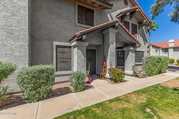 front view of a house with a yard