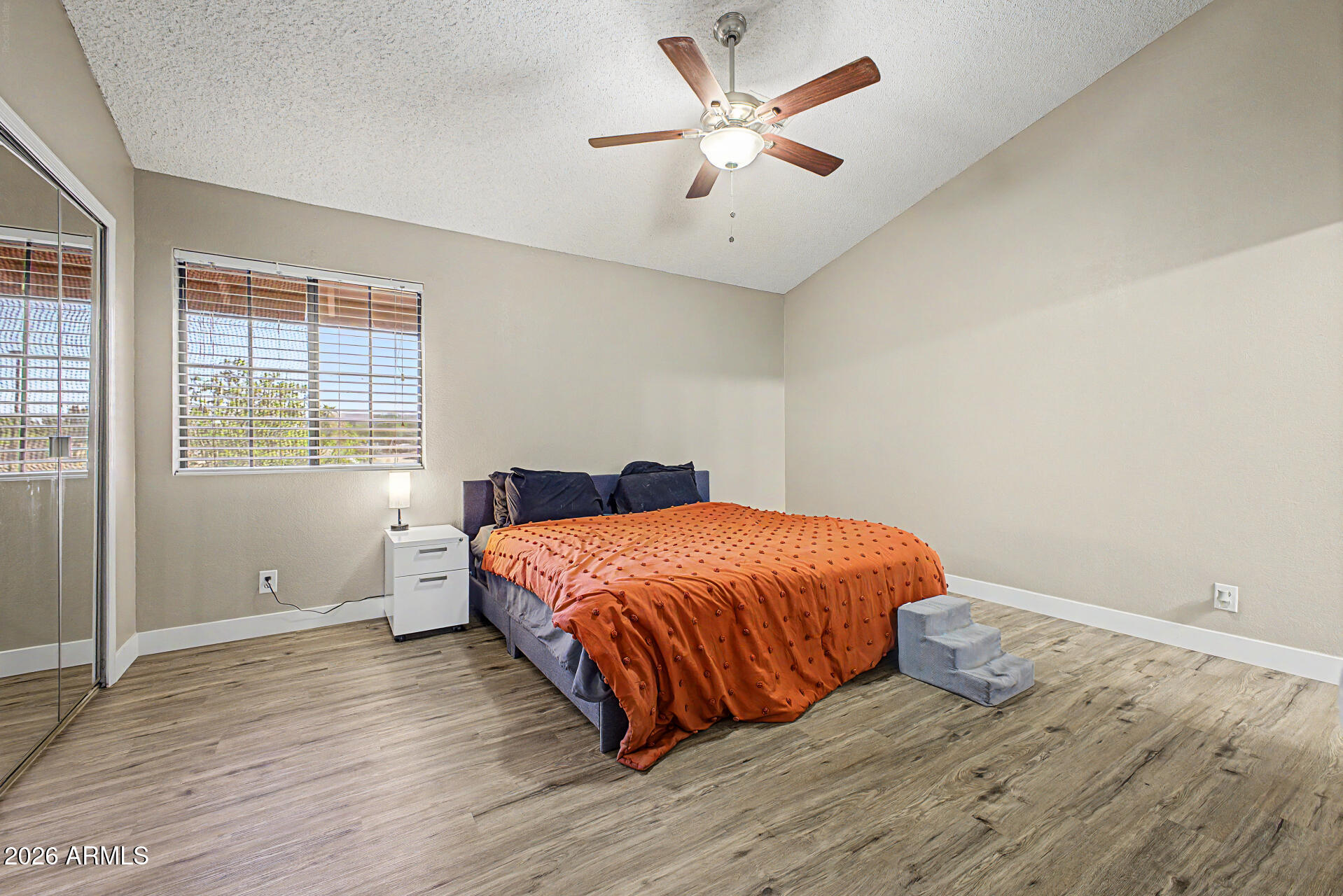 6262 East Brown Road, Unit 29 Mesa, AZ 85205 - Photo 29 of 59 a bedroom with a bed and a window
