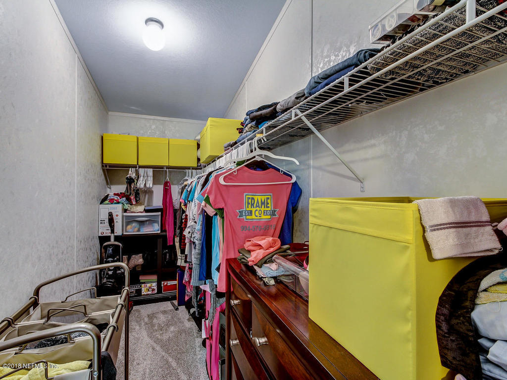 2244 Marlee Road South St. Johns, FL 32259 - Photo 16 of 38 a utility room with dryer and washer