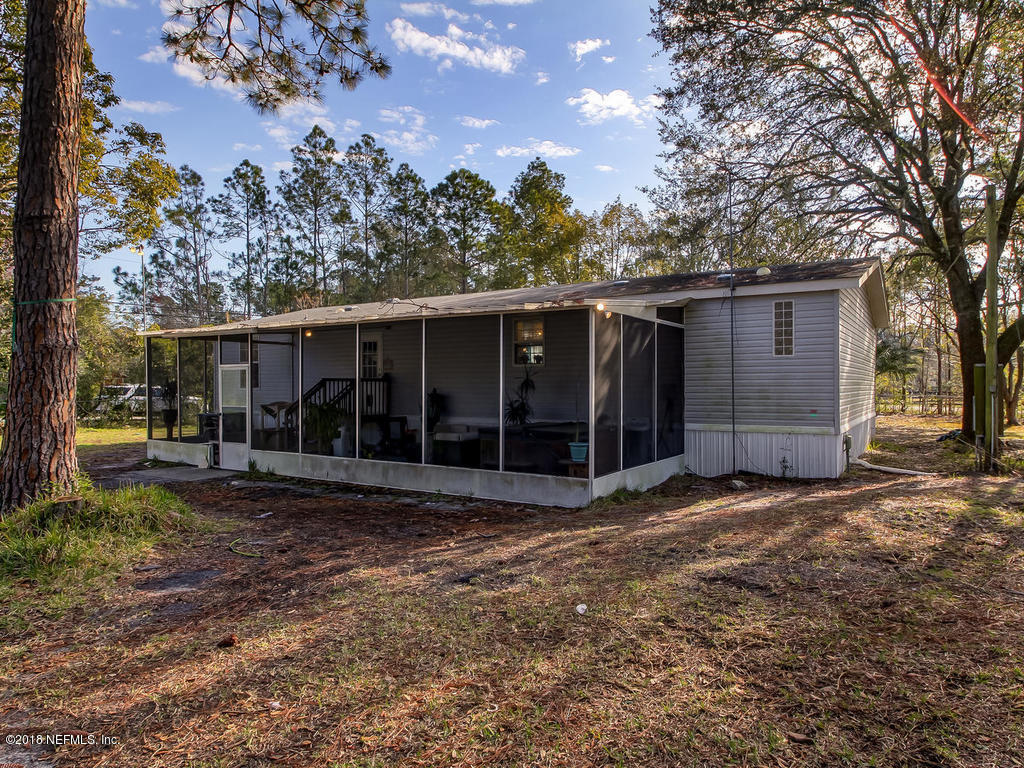 2244 Marlee Road South St. Johns, FL 32259 - Photo 29 of 38 a view of a house with a yard