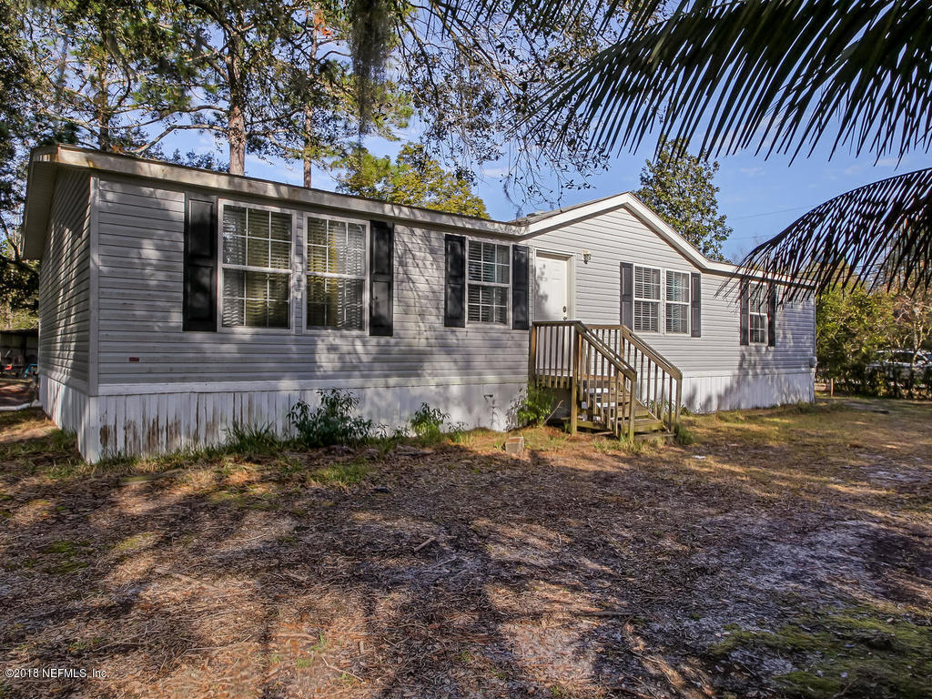 2244 Marlee Road South St. Johns, FL 32259 - Photo 3 of 38 a view of a house with a yard