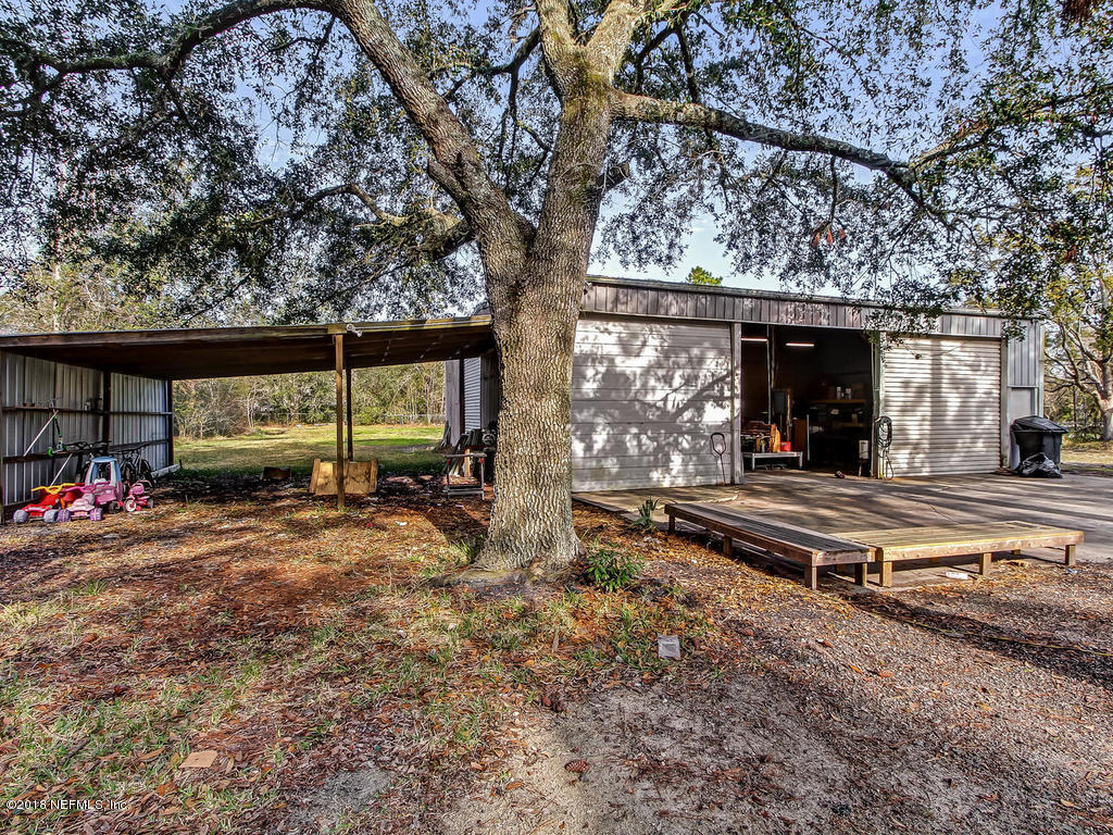 2244 Marlee Road South St. Johns, FL 32259 - Photo 32 of 38 a view of outdoor space yard and patio