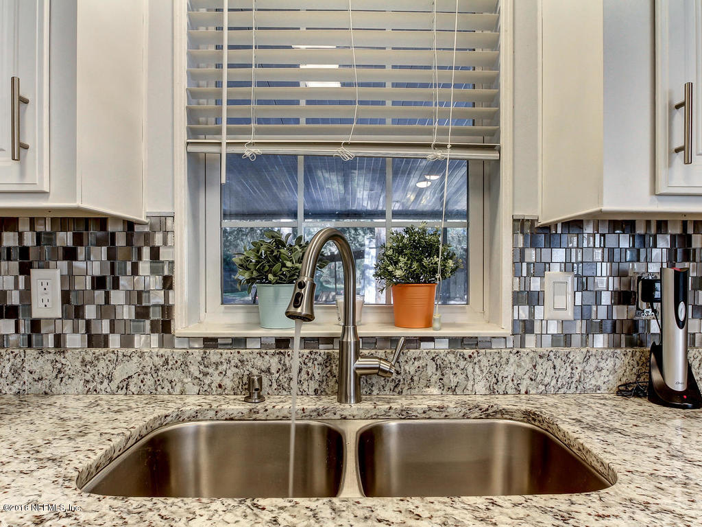 2244 Marlee Road South St. Johns, FL 32259 - Photo 7 of 38 a kitchen with a sink and a window