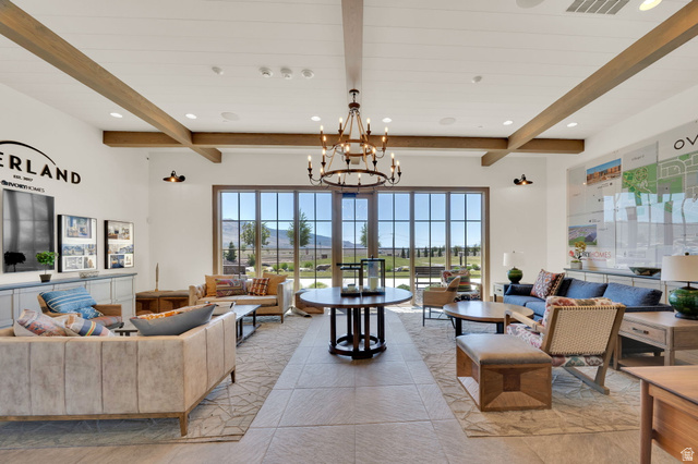 6120 North Sheps Ridge Road Eagle Mountain, UT 84005 - Photo 23 of 43 Spacious interior featuring exposed wood ceiling beams and a large chandelier