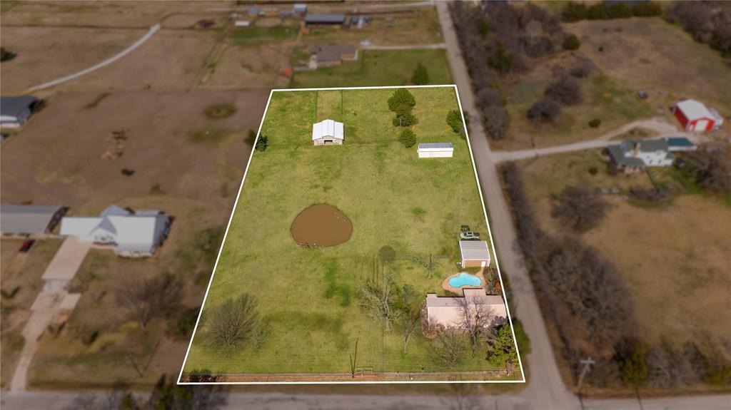 9213 Wilson Road, Pilot Point, TX 76258 - aerial - Aerial view of  property parcel outlined