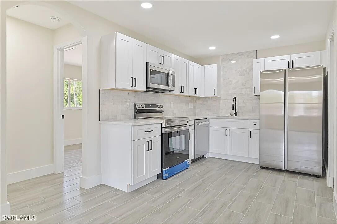 4733 28th Street Southwest Lehigh Acres, FL 33973 - Photo 4 of 10 Kitchen