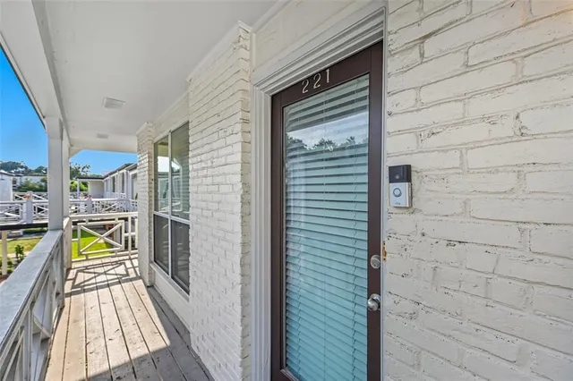 a view of a balcony with hardwood