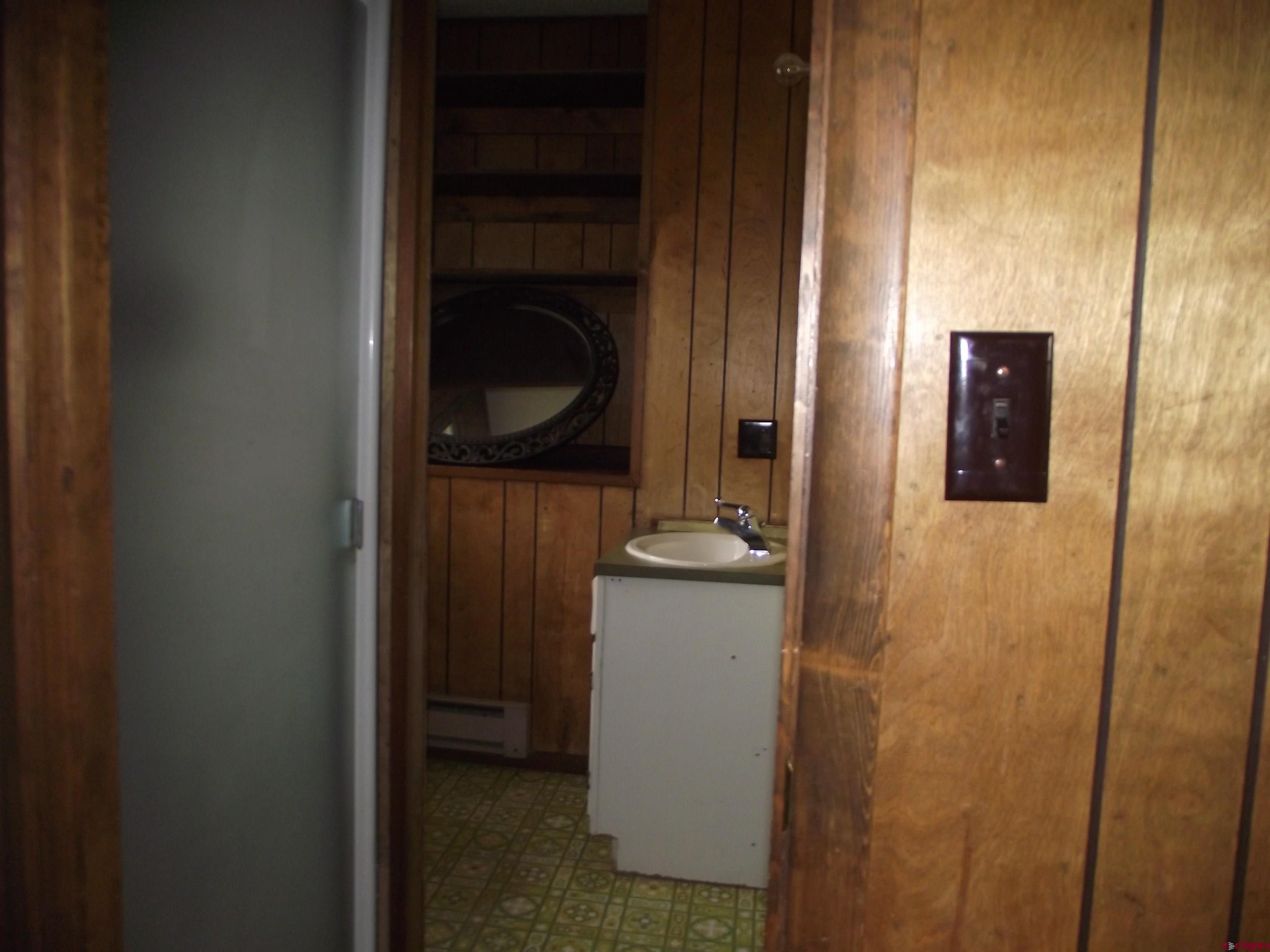 42996 Needle Rock Road Crawford, CO 81415 - Photo 25 of 45 a utility room with dryer and washer