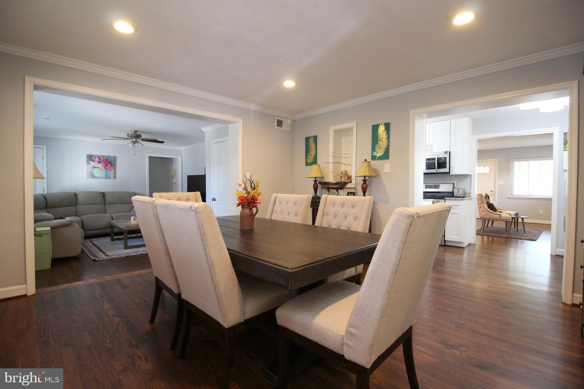 3287 Annandale Road Falls Church, VA 22042 - Photo 16 of 31 a view of a dining room with furniture and wooden floor