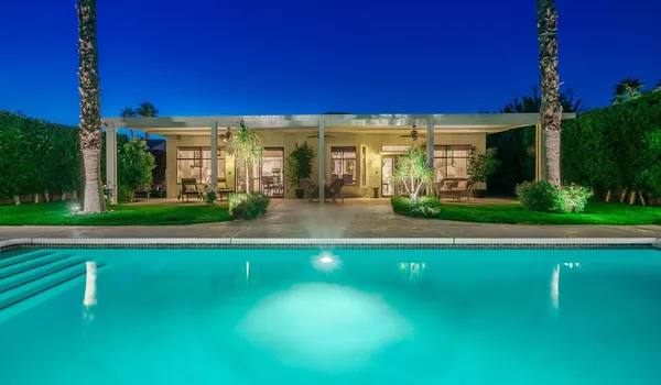 a view of a building with a swimming pool