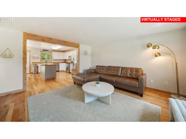 a living room with furniture and a couch