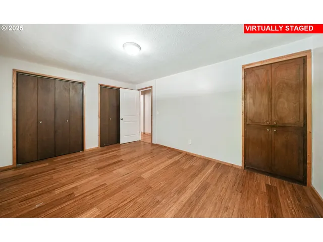 a open kitchen with wooden floor
