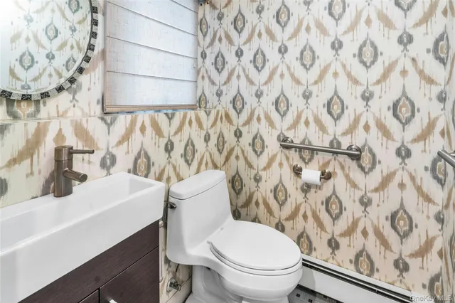 a bathroom with a sink and a toilet