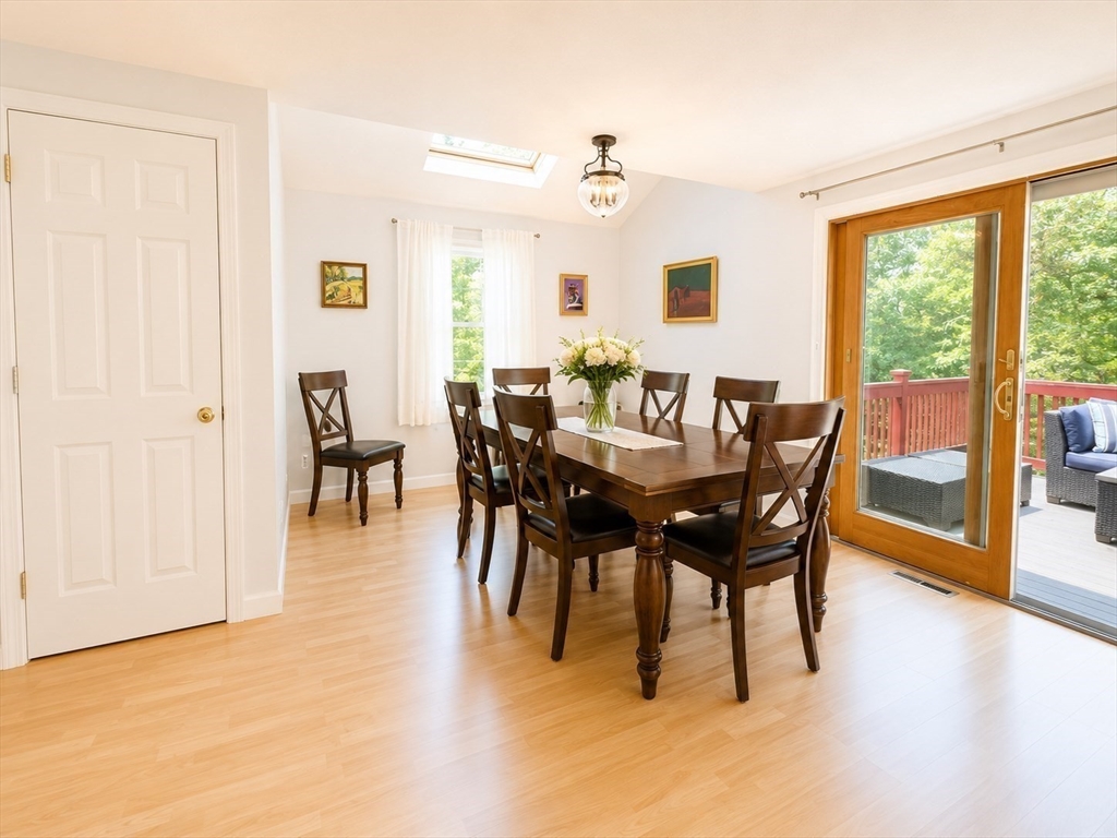 38 Crescent Road, Unit 38 Needham, MA 02494 - Photo 3 of 23 a view of a dining room with furniture window and outside view