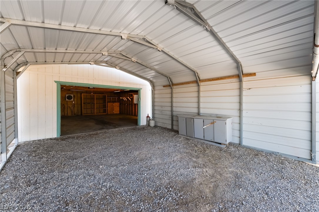 3631 South Blagg Road Pahrump, NV 89048 - Photo 3 of 47 A spacious detached carport provides ample covered parking and direct access to additional garage storage.