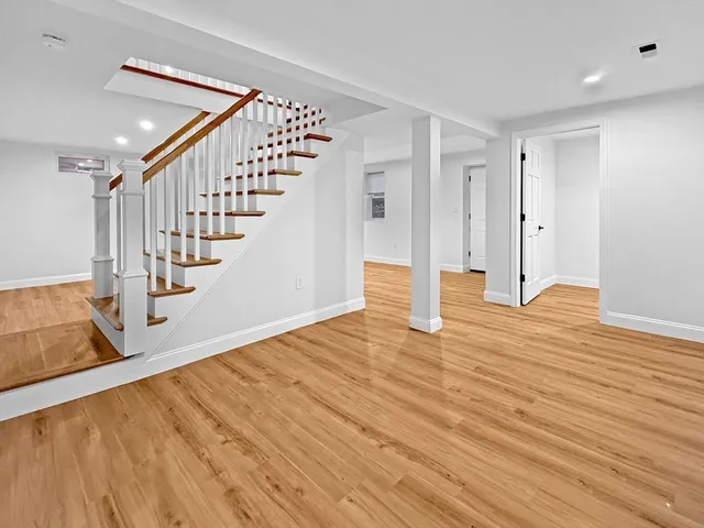 a view of entryway with wooden floor