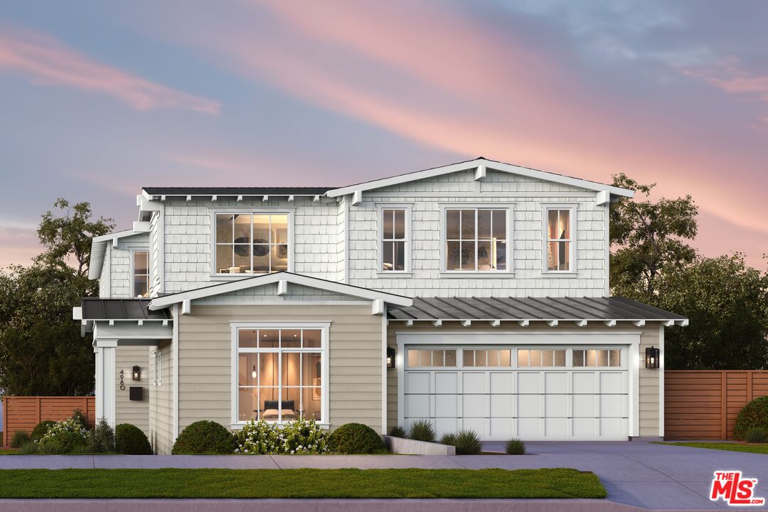 1726 Voorhees Avenue Manhattan Beach, CA 90266 - Photo 1 of 12 a front view of a house with a yard