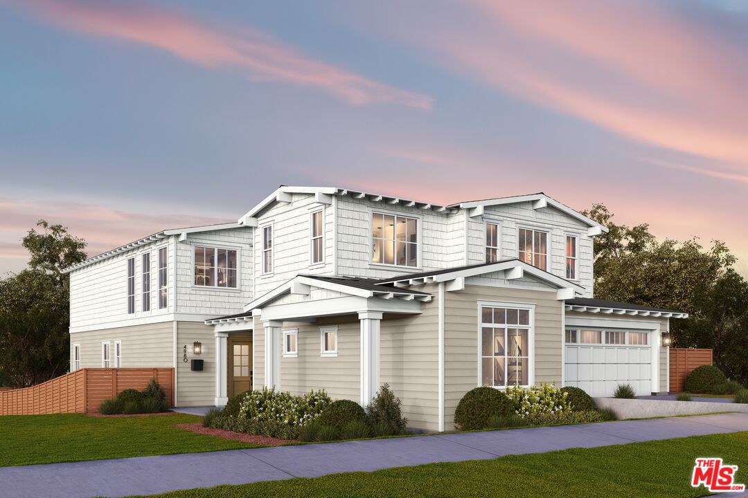 1726 Voorhees Avenue Manhattan Beach, CA 90266 - Photo 2 of 12 a front view of a house with a yard