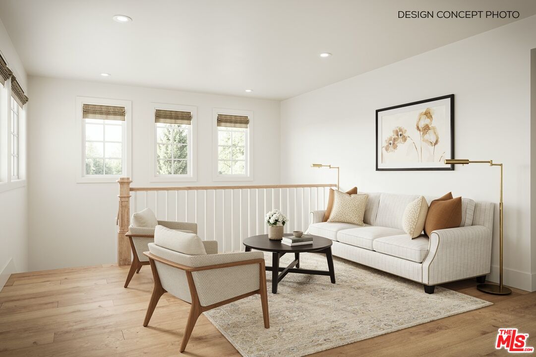 1726 Voorhees Avenue Manhattan Beach, CA 90266 - Photo 7 of 12 a living room with furniture and a window