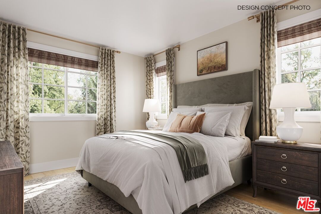 1726 Voorhees Avenue Manhattan Beach, CA 90266 - Photo 8 of 12 a bedroom with a bed and a window