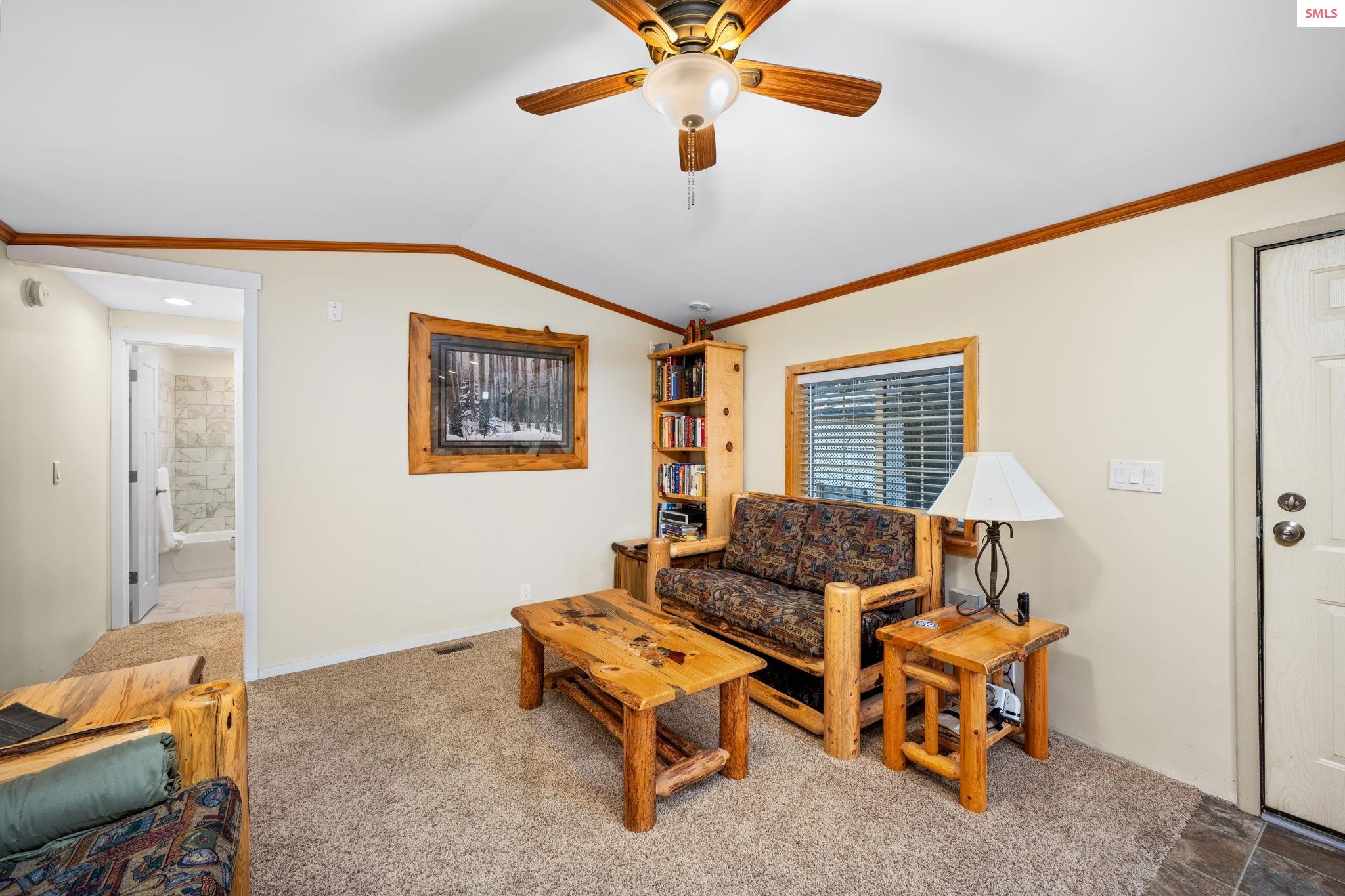 9140 North Starr Loop Hayden, ID 83835 - Photo 12 of 22 Enter into this warm and inviting home off the covered front porch to open concept living area