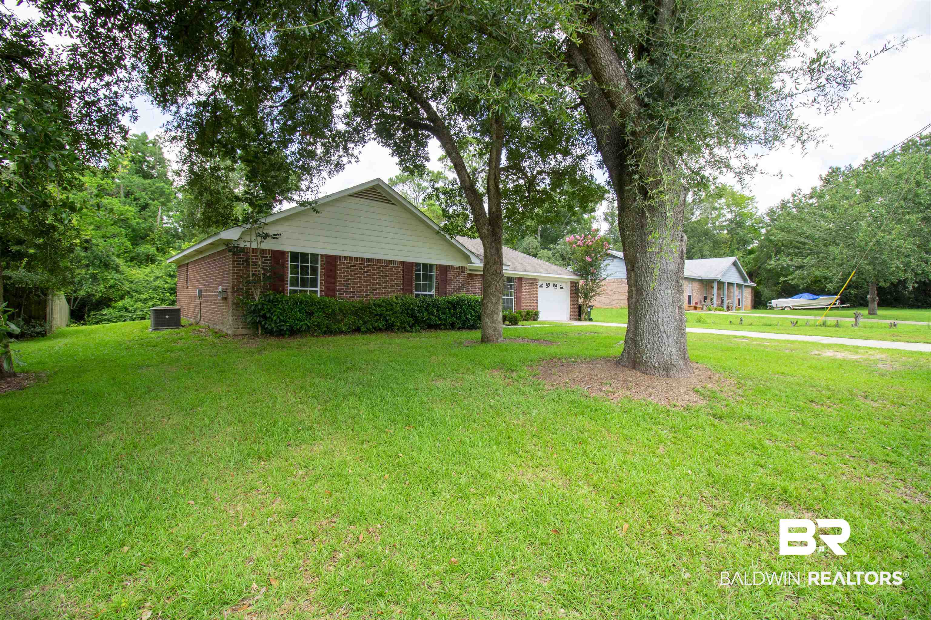13255 Pointer Drive West Foley, AL 36535 - Photo 8 of 25 Single story home with a garage and a front lawn